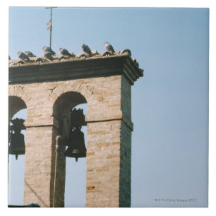 Old-fashioned church bells, Assisi, Italy Tile