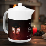 Old Lantern Light Merry Christmas Script Family<br><div class="desc">Old Lantern Light Merry Christmas Script Family teapot. Old rustic light lantern in the festive holiday mood with white script. Add your name and year.</div>