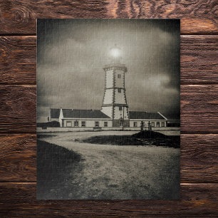 Old lighthouse on a storm night jigsaw puzzle