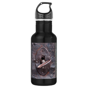 Old lock with key 532 ml water bottle