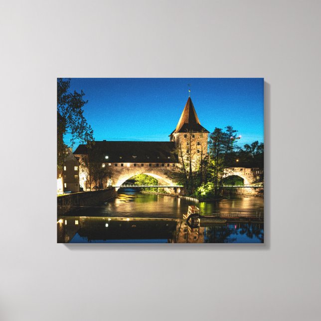 Old medieval bridge at night in Nuremberg Canvas Print (Front)