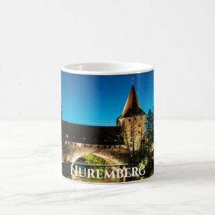 Old medieval bridge at night in Nuremberg Coffee Mug