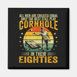 Old men play cornhole in 80s funny bean bag toss magnet