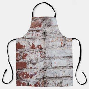 Old painted brick wall with peeling white paintwal apron