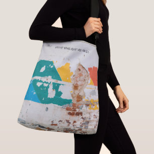Old painted wall with graffiti  crossbody bag