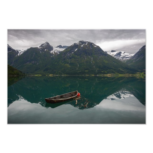 Old rowboat with mountain reflection photo print (Front)