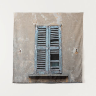 Old ruined wooden window of old houseancient,antiq tapestry