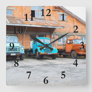 old rusty farm trucks in field big square wall clock
