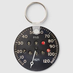 Old speedometer gauge from a vintage race car keychain