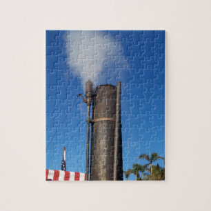 old steam whistle with a white plume of steam jigsaw puzzle