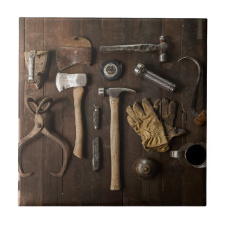Old Tools on Wood Background Ceramic Title Tile