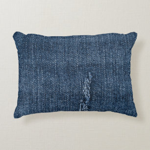 Old torn denim: jeans texture. accent pillow