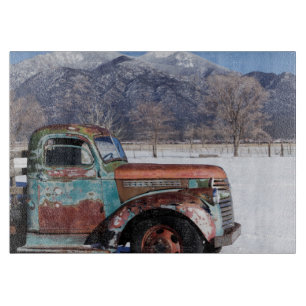 Old truck sitting in the field cutting board