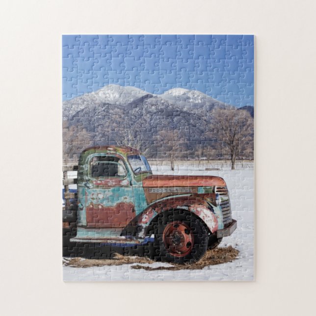 Old truck sitting in the field jigsaw puzzle (Vertical)