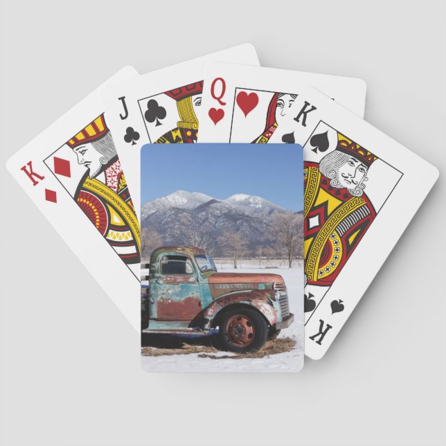 Old truck sitting in the field playing cards (Back)