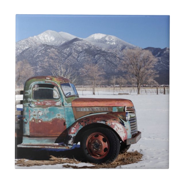 Old truck sitting in the field tile (Front)