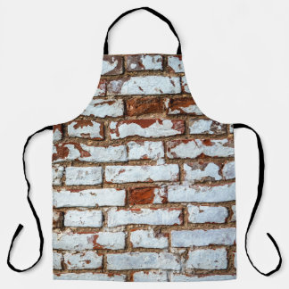 Old vintage brick wall with sprinkled white plaste apron