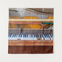 Old vintage piano with the lid off. A dilapidated