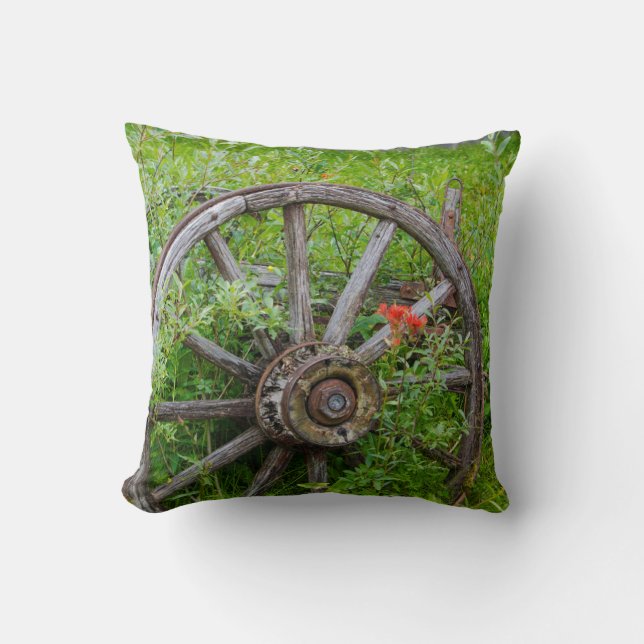 Old wagon wheel in historic old gold town 3 throw pillow (Front)