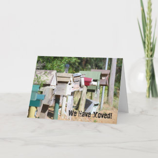 Old wooden aged letter boxes for We have moved! Announcement
