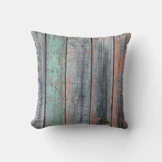 Old wooden fence painted in different colour, tren throw pillow