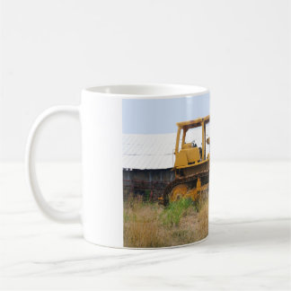 Old Yellow Bulldozer Parked In A Pasture Coffee Mug