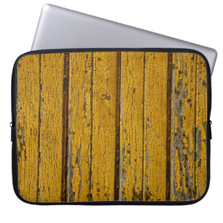 Old yellow door or fence with different paint, nat laptop sleeve