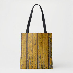 Old yellow door or fence with different paint, nat tote bag