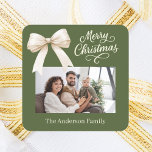 Olive green cream bow photo script Christmas Square Sticker<br><div class="desc">A muted olive green background,  cream coloured text and a bow. Merry Christmas is written with an elegant hand-lettered style font. Personalize and add your family name.</div>