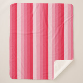 Ombre stripes in red to pink tones sherpa blanket