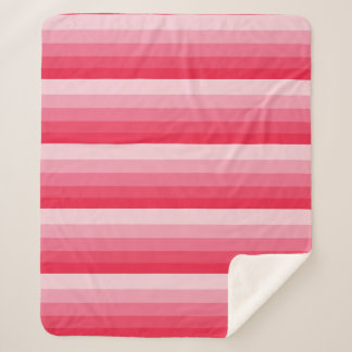 Ombre stripes in red to pink tones sherpa blanket