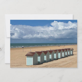 On the beach under the clouds