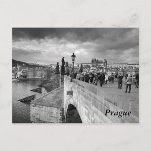 on the Charles Bridge under a stormy sky in Prague Postcard
