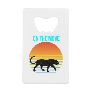 On the Move – Panther Walking Under a Retro Sunset Credit Card Bottle Opener