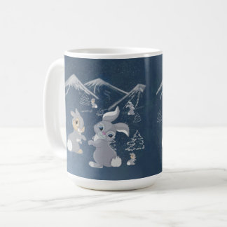 on the snowy mountains under the trees cute rabbit coffee mug