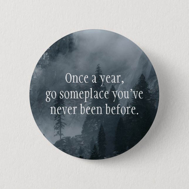 Once a year, go somewhere you've never been before 2 inch round button (Front)