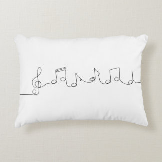 One line drawing of musical notes accent pillow