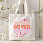 One Love Teacher Pink Modern Personalized Name Tote Bag<br><div class="desc">One Love Teacher Pink Modern Personalized Name features the text "one loved teacher" in modern pink script typography accented with love hearts and personalized with your custom name. Perfect for your favourite teacher for teacher appreciation,  birthday,  Christmas,  holidays and more. Designed by Evco Studio www.zazzle.com/store/evcostudio</div>