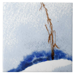 One small steam of straw in a large snow drift tile