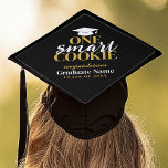 One Smart Cookie - Modern Black Gold Graduation Cap Topper<br><div class="desc">One Smart Cookie - A modern black and gold topper with a gold grad cap and bold text with a theme. A great graduation party decor addition to celebrate the graduate. Personalize with a name and date.</div>