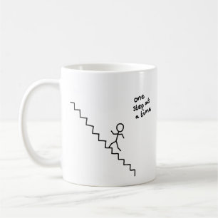 "one step at a time" stick man on the stairs mug