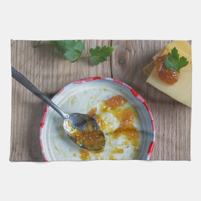 Onion pineapple chutney on rustic wood kitchen towel (Horizontal)