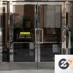 Open hours sign on the glass door
