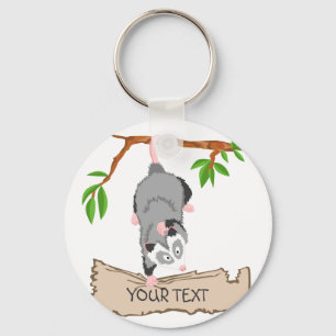 Opossum with sign keychain