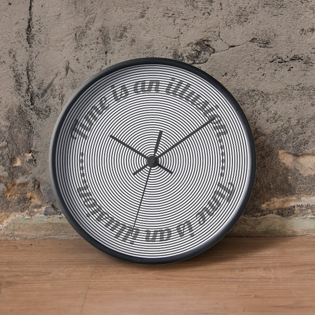 Optical Illusion Modern Decorative Wall Clock (funky black and white spiral optical illusion and the Einstein quote " time is an illusion ". )