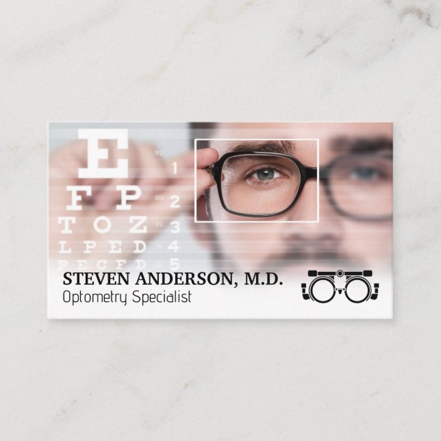 Optometrist | Man Taking Eye Exam Business Card (Front)