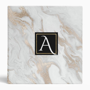 Or et classeur décoré d'un monogramme marbré par