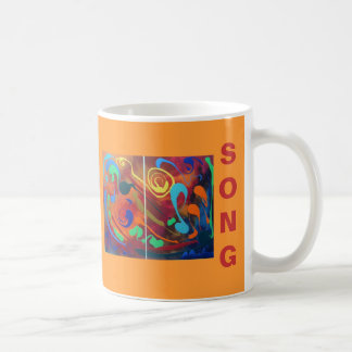 Or heureux de tasse de chat