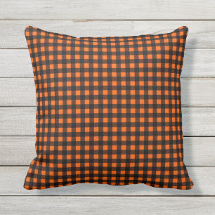 Orange and black buffalo plaid outdoor pillow
