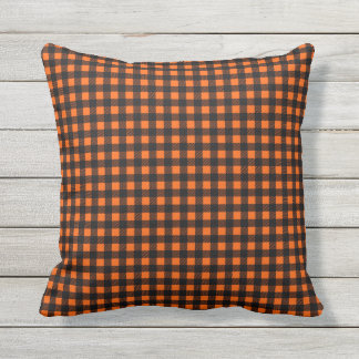 Orange and black buffalo plaid outdoor pillow